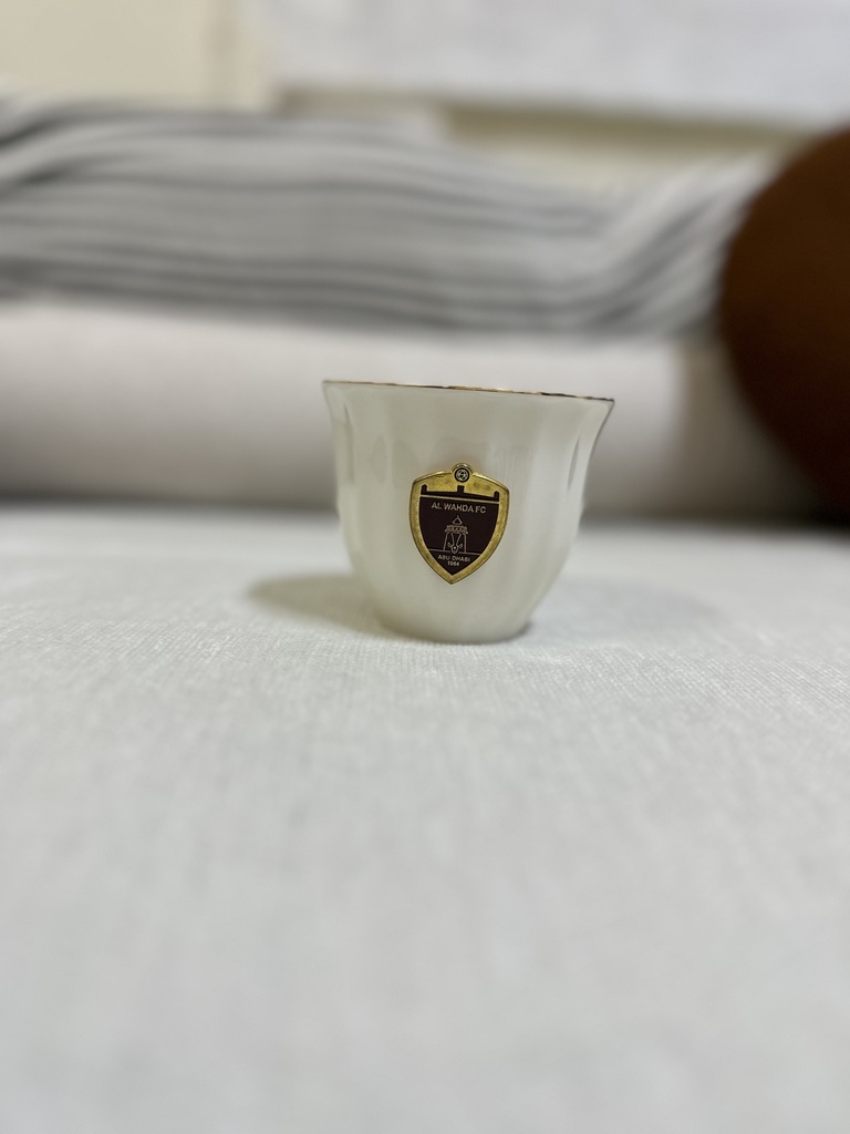 Smoker with iron logo of Al Wahda team