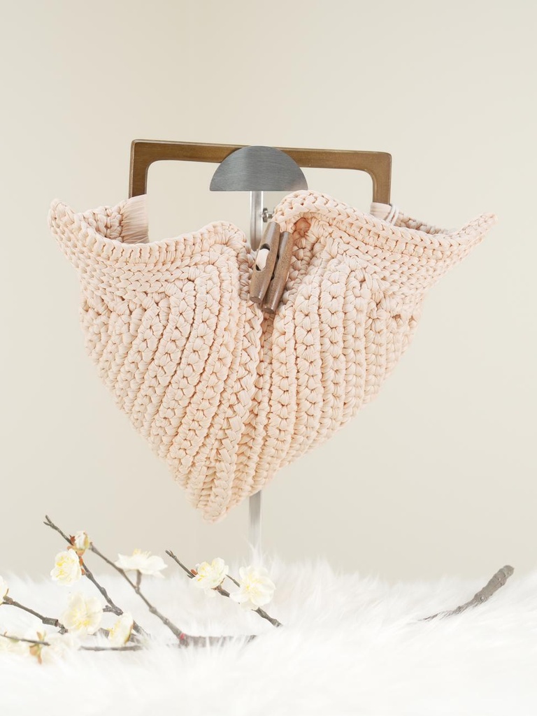 Peach Crochet Handbag with V-shaped Design, Wooden Clasp, and Geometric Handle